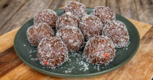 Image of choc coconut bliss balls, which are dairy free, nut free and gluten free